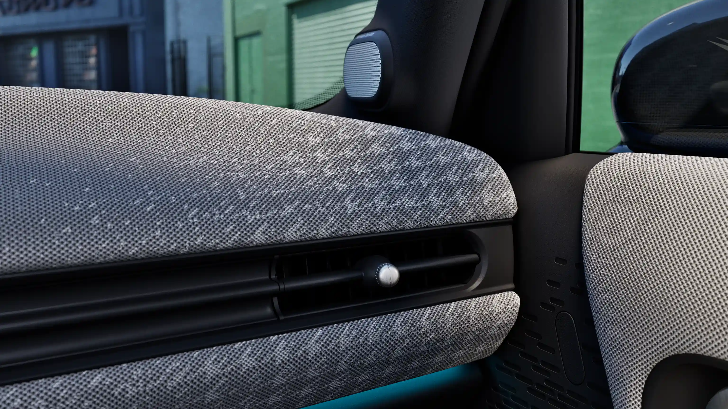 Detail view of the MINI Cooper 5-Door dashboard with blue ambient light