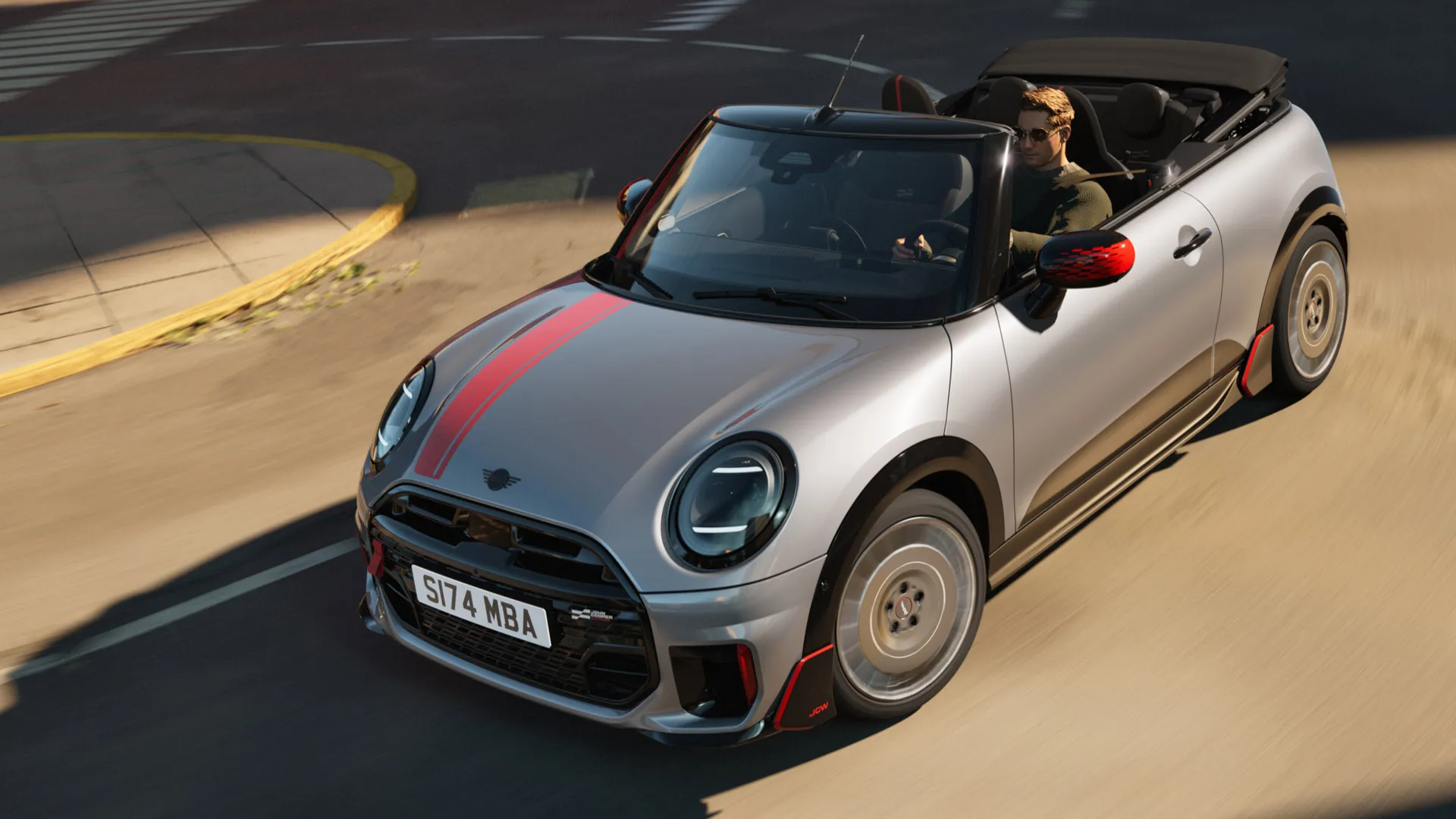 チリ・レッドのJohn Cooper Worksデカールをまとった、MINIコンバーチブル。