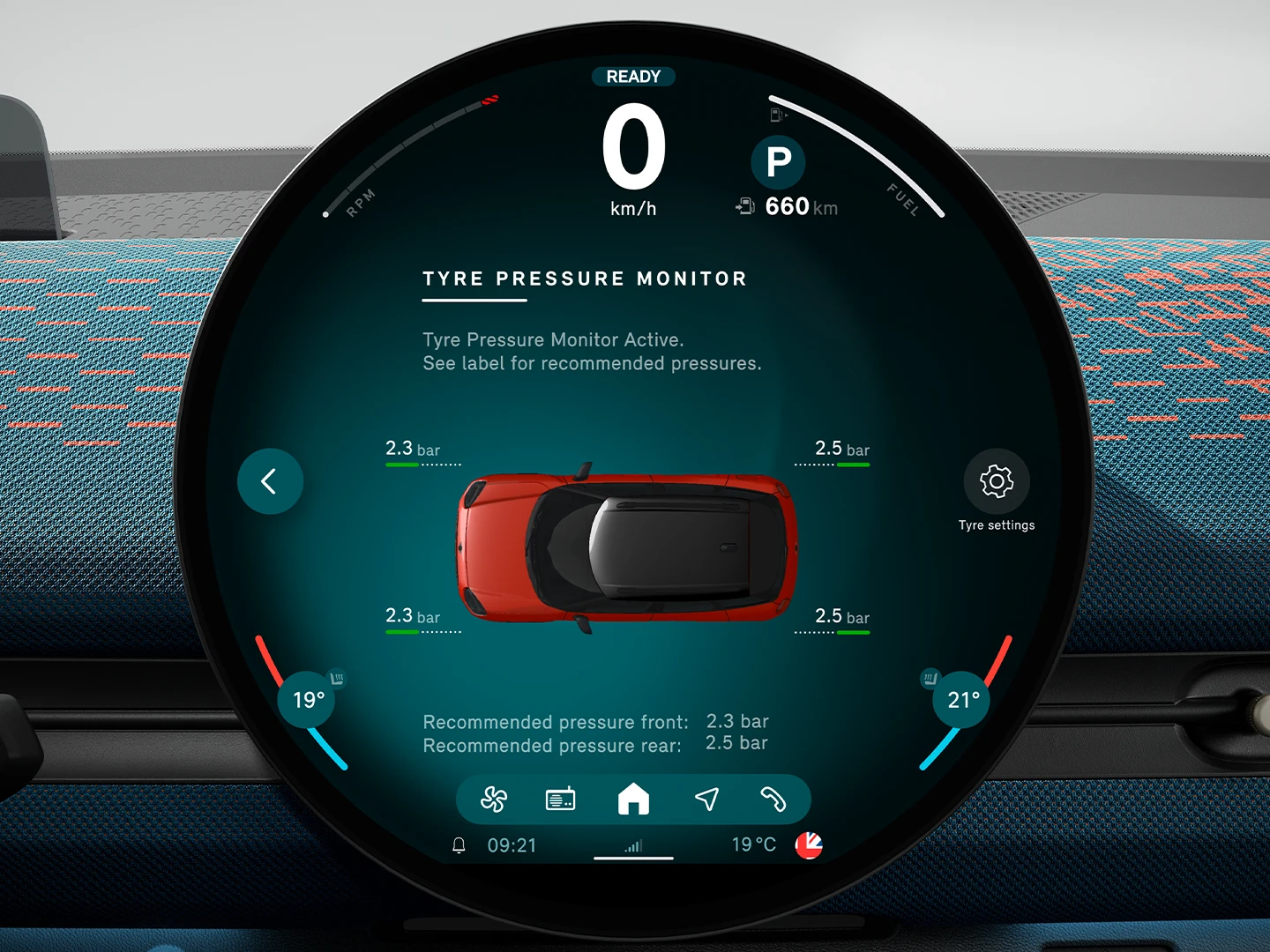 Close-up of the MINI touchscreen displaying the current Tyre Pressure Monitor information.