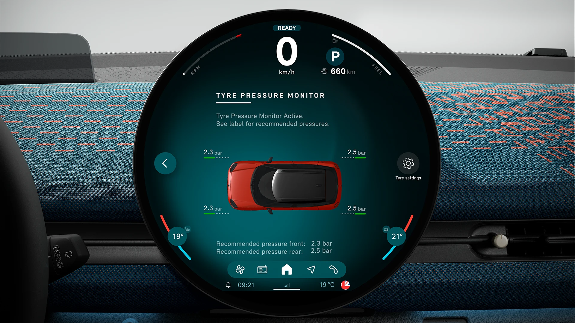 Close-up of the MINI touchscreen displaying the current Tyre Pressure Monitor information.