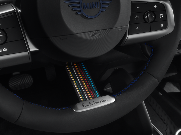 Close shot of the MINI Paul Smith Edition Steering Wheel, showcasing its unique features. 