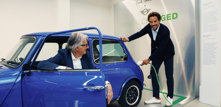 Oliver Heilmer charging MINI Recharged, with Paul Smith on board